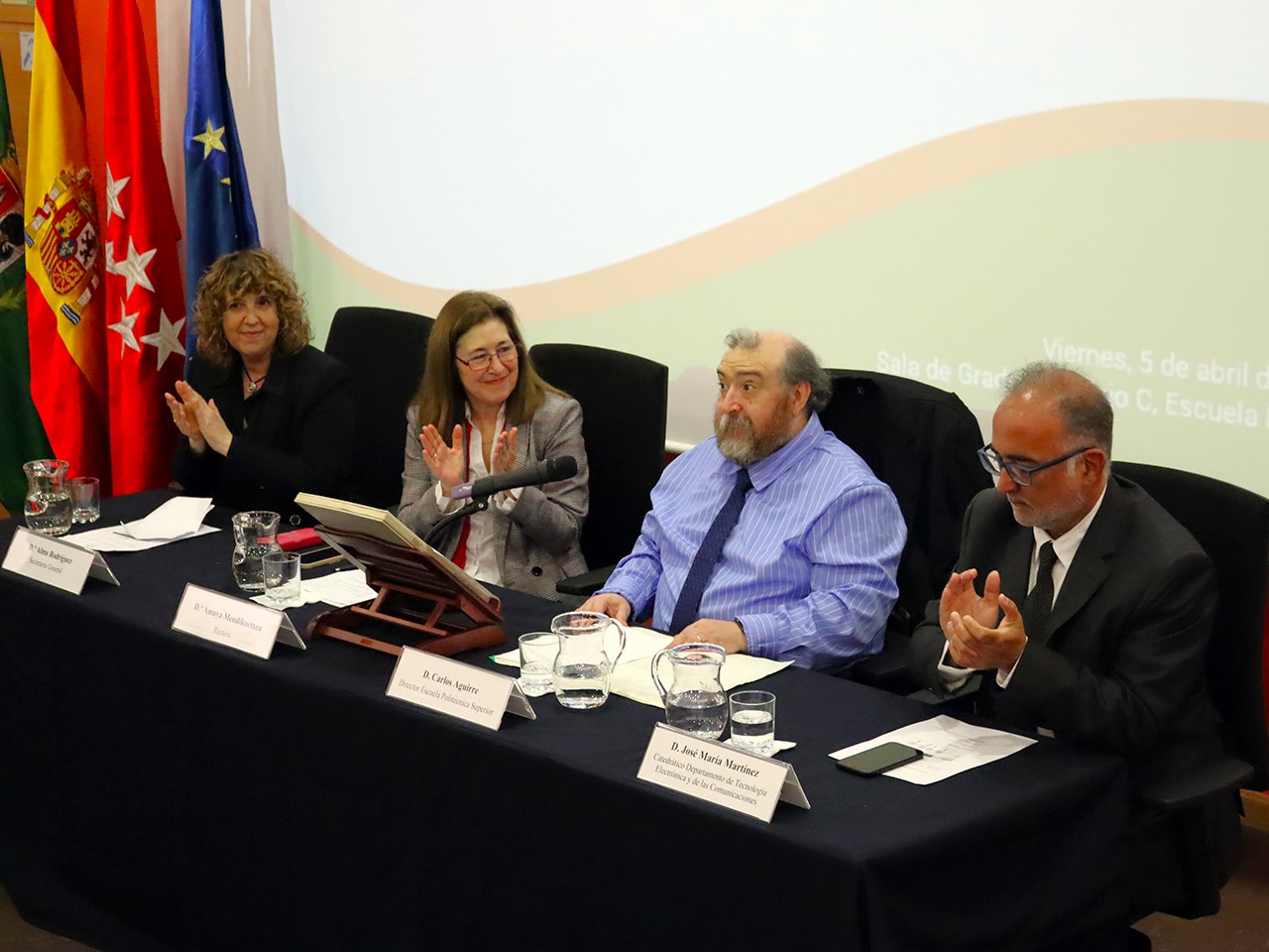 La secretaria general, Alma Rodríguez; la rectora Amaya Mendikoetxea; el director de la EPS, Carlos Aguirre; y el profesor José María Martínez (director saliente), en el acto de toma de posesión celebrado en la EPS. / UAM